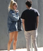 hailey-baldwin-denim-jeans-jacket-shorts-boots-grabs-lunch-with-a-friend-on-melrose-avenue-in-los-angeles-2.jpg