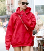 hailey-baldwin-style-red-hoodie-stylish-black-booties-ankle-boots-supreme-September-12-2017-Out-in-New-York-nyc-1.jpg