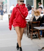 hailey-baldwin-style-red-hoodie-stylish-black-booties-ankle-boots-supreme-September-12-2017-Out-in-New-York-nyc-2.jpg