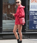 hailey-baldwin-style-red-hoodie-stylish-black-booties-ankle-boots-supreme-September-12-2017-Out-in-New-York-nyc-4.jpg
