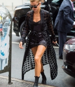 hailey-baldwin-shopping-at-balloon-saloon-in-new-york-city-black-lace-outfit-boots.jpg