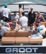 hailey-baldwin-July-7-On-a-Boat-Trip-in-Miami-purple-bikini-yatch-boat-with-friends-2017-0.jpg
