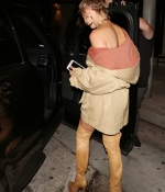 hailey-baldwin-arrives-for-dinner-at-craigs-in-high-boots-camel-beige-outfit-style-0.jpg