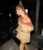 hailey-baldwin-arrives-for-dinner-at-craigs-in-high-boots-camel-beige-outfit-style-2.jpg