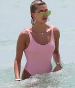 hailey-baldwin-June-10-In-Swimsuit-on-the-Beach-in-Miami-pink-swimswuit-7.jpg