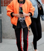 kendall-jenner-and-hailey-baldwin-out-and-about-in-new-york-2017-orange-jacket-2.jpg
